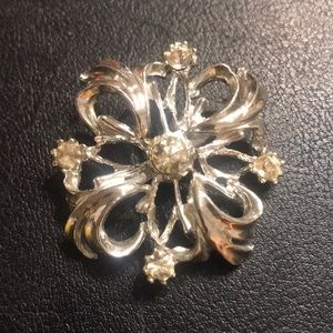 Silver metal brooch W crystal accents